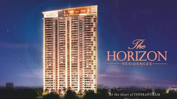 Night view of The Horizon Residences with the project name